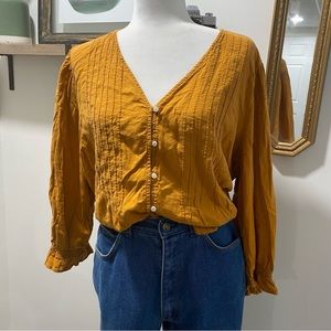 Mustard button up top